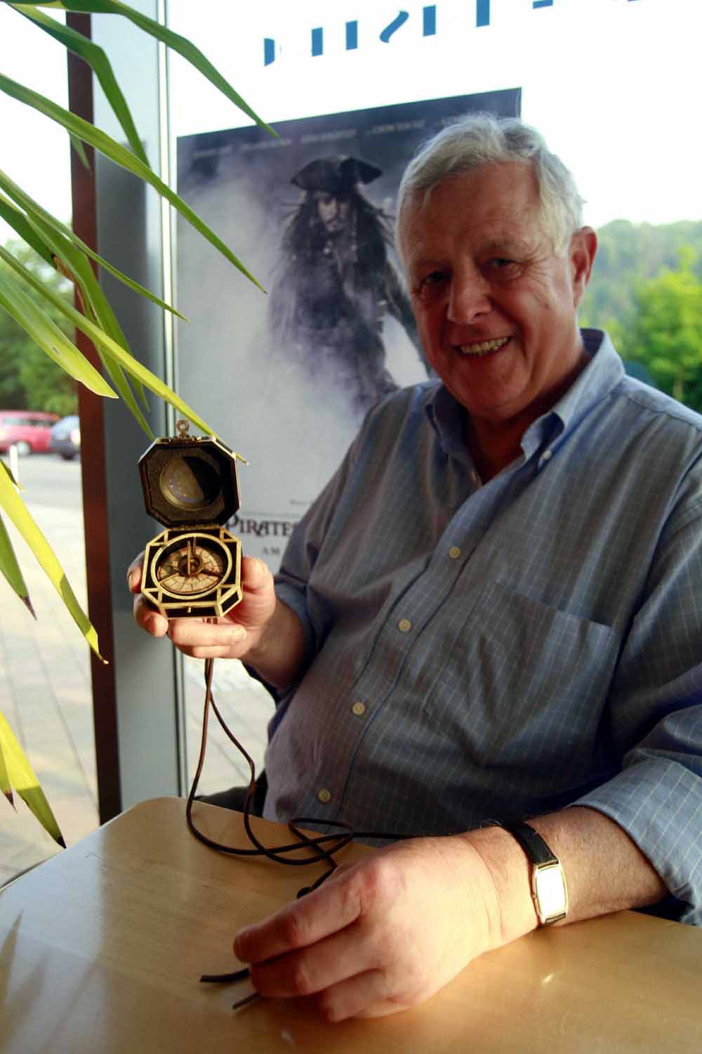 Manfred Wild holds the original compass of Captain Jack Sparrow in his hands